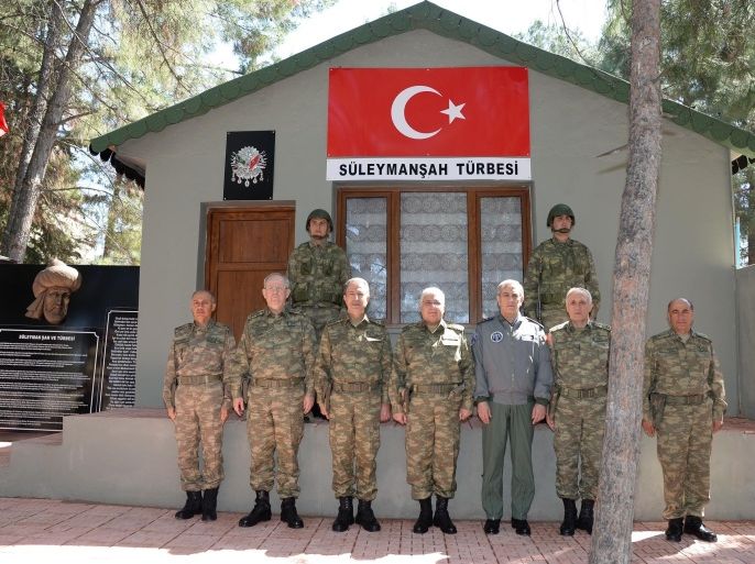 SANLIURFA, TURKEY - MARCH 26: Turkey's Chief of General Staff Necdet Ozel (C) visits the new place of Suleyman Shah Military Guardhouse at 7th border company command of 3rd border regiment of Turkish Land Forces in Sanliurfa, Turkey on March 26, 2015.