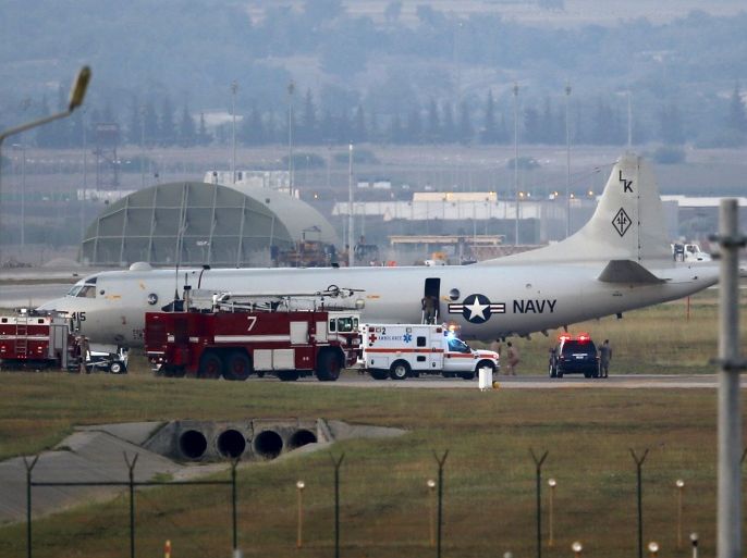 Fire trucks and and an ambulance are seen next to a U.S. Navy P-3 Orion Maritime patrol aircraft after it landed at Incirlik airbase in the southern city of Adana, Turkey, July 25, 2015. REUTERS/Murad Sezer