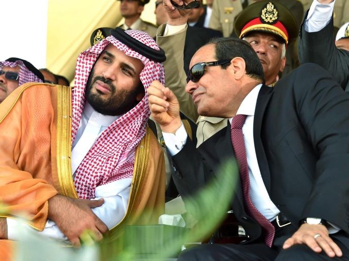 A handout picture made available by the Office of the Egyptian President shows the Saudi Deputy Crown Prince, second Deputy Premier and Minister of Defense, Mohammed bin Salman (L), sitting with the Egyptian President, Abdel Fattah al-Sisi (R), during a graduation ceremony of a Military Academy, in Cairo, Egypt, 30 July 2015. According to reports bin Salman is visiting Egypt to discuss aspects of cooperation between the two countries. Saudi Arabia, along with other Gulf states, has lent billions in aid to Egypt, which is a member of the Saudi led military coalition that has been carrying out airstrikes in Yemen since 25 March 2015. EPA/OFFICE OF THE EGYPTIAN PRESIDENT / HANDOUT