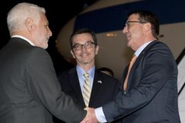 U.S. Defense Secretary Ash Carter, right, is greeted by Israel Defense Ministry Director General Dan Harel, left, and U.S. Embassy Deputy Chief of Mission William Grant, center as he arrives at Ben Gurion International Airport in Tel Aviv, Israel, Sunday, July 19, 2015. Carter has traveled to Israel to talk with officials there as well as Jordan and Saudi Arabia, U.S. allies whose leaders also are worried about the Iran nuclear deal's implications. (AP Photo/Carolyn Kaster, Pool)