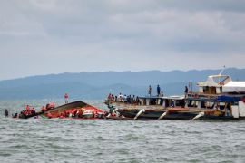 A general view of the ongoing search and rescue operation next to a motorized boat that capsized off Ormoc City, Leyte province, Philippines, 02 July 2015. At least 36 people were killed when a passenger boat capsized off the central Philippines on 02 July 2015, with 19 still missing, a coast guard spokesman said. Emergency teams rescued 118 people from the seas off Ormoc City in Leyte province, 560 kilometres south-east of Manila, where the accident happened, said Commander Armand Balilo. The boat was carrying 173 passengers and 16 crew members, according to Balilo and the police.