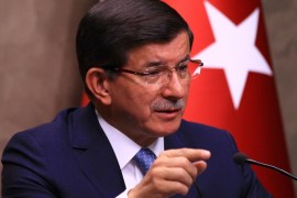 ANKARA, TURKEY - JULY 25: Turkey's Prime Minister Ahmet Davutoglu holds a press conference on terrorist groups Daesh in Syria and the PKK in Iraq at the Esenboga International Airport in Ankara on July 25, 2015 ahead of his departing for Istanbul.