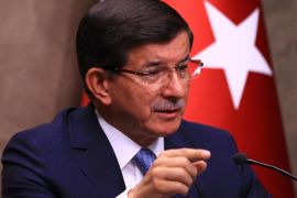ANKARA, TURKEY - JULY 25: Turkey's Prime Minister Ahmet Davutoglu holds a press conference on terrorist groups Daesh in Syria and the PKK in Iraq at the Esenboga International Airport in Ankara on July 25, 2015 ahead of his departing for Istanbul.