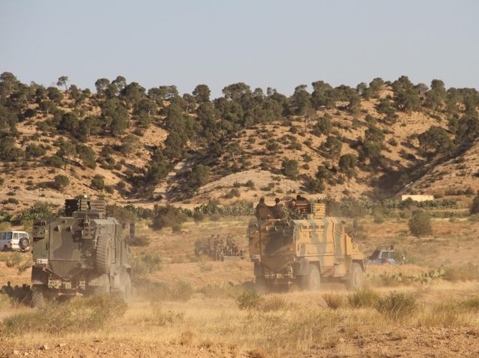 KASSERINE, TUNISIA - JULY 4: Military vehicles belonging to the Tunisian security forces are seen near Mount El-Selum as they carry out a military operation against possible terrorist cells in Kasserine, Tunisia on July 4, 2015. Tunisian security forces undertook a wide-scale military operation against possible terrorist cells in the city of Kassarine in the West of the country. Security forces including the police, army and National Security Personnel searched the area around El-Selum mountain.