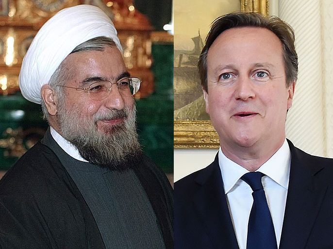 رئيس الوزراء البريطاني ديفيد كاميرون والرئيس الإيراني حسن روحاني