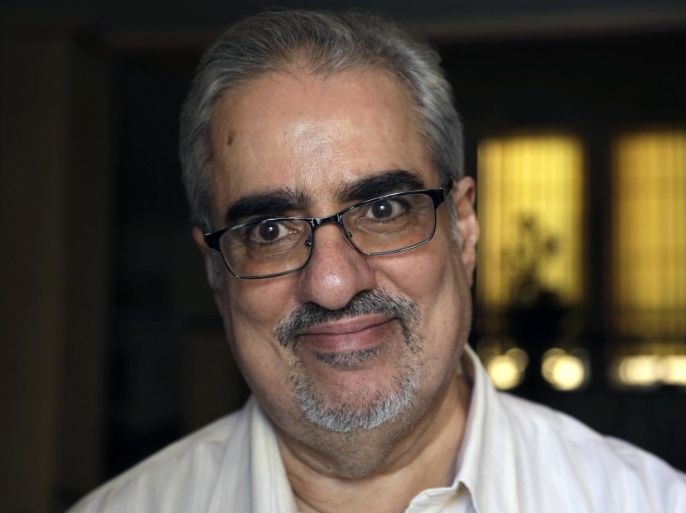 Bahraini Sunni Muslim opposition leader Ibrahim Sharif, who led the secular opposition WAAD (National Democratic Action Society) group, smiles to journalists at his home following his overnight release from prison, in Tubli, Bahrain, Saturday, June 20, 2015. Sharif was one of 20 prominent pro-democracy activists calling for political reforms who were convicted by a military-led tribunal after the government cracked down on them in March 2011. (AP Photo/Hasan Jamali)