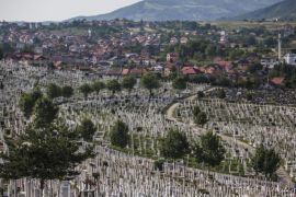SARAJEVO, BOSNIA AND HERZEGOVINA - JULY 08: A general view of the city cemetery on July 8, 2015 in Sarajevo, Bosnia and Herzegovina. The newly-identified remains of another 136 victims from Srebrenica massacre will be buried at the ceremony on July 11, 2015 on the 20th anniversary of the massacre. At least 8,300 Bosnian Muslim men and boys who had sought safe heaven at the U.N.-protected enclave at Srebrenica were killed by members of the Republic of Serbia (Republika Srpska) army under the leadership of General Ratko Mladic, who is currently facing charges of war crimes at The Hague, during the Bosnian war in 1995.