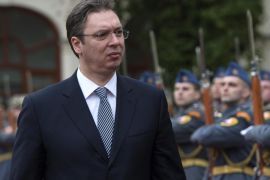 Serbia's Prime Minister Aleksandar Vucic (L) inspects a military honor guard in Bratislava, Slovakia, on April 2, 2015, during a meeting with the Slovakian Prime Minister. Serbia's Prime Minister Vucic arrived for a one-day offical visit in Slovakia. AFP PHOTO / SAMUEL KUBANI