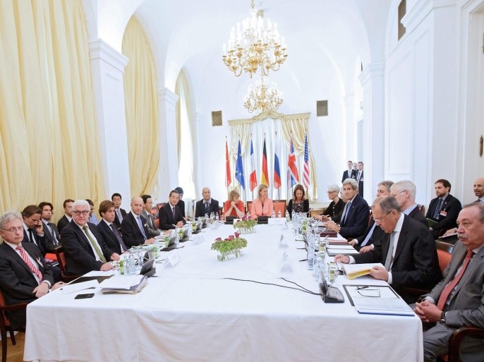 German Foreign Minister Frank-Walter Steinmeier (2-L), French Foreign Minister Laurent Fabius (4-L), Chinese Foreign Minister Wang Yi (6-L), European Union High Representative for Foreign Affairs and Security Policy Federica Mogherini (C), US Secretary of State John Kerry (5-R), British Foreign Secretary Philip Hammond (4-R) and Russian Foreign Minister Sergey Lavrov (2-R) during a photo opportunity at the Palais Coburg where talks between the E3+3 (France, Germany, UK, China, Russia, US) and Iran on its nuclear program continue, in Vienna, Austria, 06 July 2015. Western chief diplomats urged Iran to seize the opportunity to end the long stand-off over the its nuclear programme, as they started a last effort on 05 July to clinch a broad agreement with the Islamic republic. Foreign ministers from Britain, China, France, Russia, the United States and Germany gathered Sunday evening in Vienna ahead of a self-imposed 07 July deadline to strike a deal with Iran.