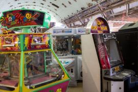 MARGATE, ENGLAND - JUNE 18: Arcade games are stored at Dreamland amusement park on June 18, 2015 in Margate, England. Dreamland is considered to be the oldest-surviving amusement park in Britain, the site originally used as 'Hall by the Sea' since 1860 until being renamed after purchase by John Henry Iles in 1920. In 2003, after decades of decline and a series of owners, the park was under threat of closure and commercial redevelopment. After a successful 'Save Dreamland Campaign' from which the Dreamland Trust raised £18m of public funding to restore Dreamland's Grade II listed Scenic Railway, Grade II listed cinema complex and Grade II-listed menagerie cages the Dreamland restoration project began in January 2010.