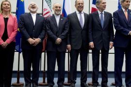 (From L to R) European Union High Representative for Foreign Affairs and Security Policy Federica Mogherini, Iranian Foreign Minister Mohammad Javad Zarif, Head of the Iranian Atomic Energy Organization Ali Akbar Salehi, Russian Foreign Minister Sergey Lavrov, British Foreign Secretary Philip Hammond and US Secretary of State John Kerry pose for a group picture at the United Nations building in Vienna, Austria July 14, 2015. Iran and six major world powers reached a nuclear deal, capping more than a decade of on-off negotiations with an agreement that could potentially transform the Middle East, and which Israel called an 'historic surrender'. AFP PHOTO / POOL / JOE KLAMAR