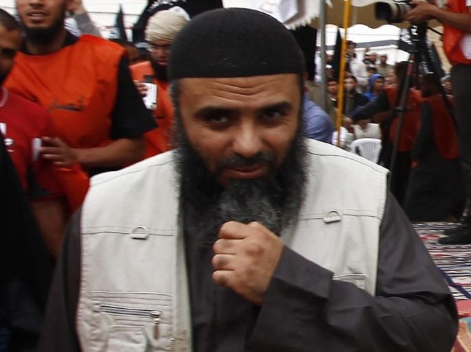 Saifallah Benahssine, better known as Abu Iyadh, the de facto leader of Tunisia's Salafi Islamists, attends a rally in the central town of Kairouan in this May 20, 2012 file picture. Tunisian state media said the head of the country's Islamist militants had been captured in Libya by U.S. and Libyan forces on December 30, 2013, though his organisation denied he had been detained. The U.S. army also said it had not played any part in any move against Ansar al Sharia leader Abu Iyadh - the man accused of inciting an attack on the U.S. embassy in Tunisia in 2012. REUTERS/Anis Mili/Files (TUNISIA - Tags: POLITICS CIVIL UNREST CRIME LAW)
