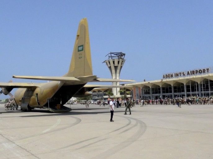 A Saudi military cargo plane is seen at the international airport of Yemen's southern port city of Aden July 22, 2015. A Saudi military plane loaded with arms for fighters loyal to Yemen's deposed president landed at Aden airport on Wednesday, an airport official said, the first flight to reach the embattled port city in four months. REUTERS/Stringer