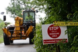 A telescopic forklift vehicle leaves Field Foot Farm where an outbreak of H7N7 avian flu was detected in the village of Goosnargh, near Preston, north west England on July 13, 2015. British authorities today confirmed an outbreak at a farm of a strain of avian flu that is both highly contagious and potentially deadly for birds, but said the risk to people was very low.AFP PHOTO / OLI SCARFF