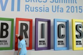 An employee cleans a board during the preparations for the BRICS summit in Ufa, Russia, July 7, 2015. The BRICS emerging economies will launch a development bank at a summit this week which President Vladimir Putin hopes will help reduce Western dominance of world financial institutions and show Moscow is not isolated. REUTERS/BRICS Photohost/RIA Novosti ATTENTION EDITORS - THIS IMAGE HAS BEEN SUPPLIED BY A THIRD PARTY. IT IS DISTRIBUTED, EXACTLY AS RECEIVED BY REUTERS, AS A SERVICE TO CLIENTS.