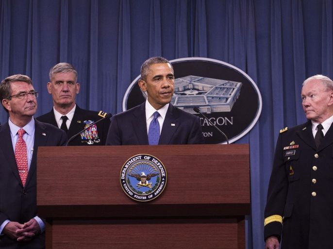 ARLINGTON, VA - JULY 6: (AFP OUT) U.S. President Barack Obama delivers remarks after meeting with members of his national security team concerning ISIS at the Pentagon July 6, 2015 in Arlington, Virginia. From left, Secretary of Defense Ashton Carter, Commander of U.S. Africa Command Gen. David Rodriguez, and Chairman of the Joint Chiefs of Staff General Martin Dempsey. Obama announced the U.S. military is making progress against the Islamic State in Iraq and Syria.