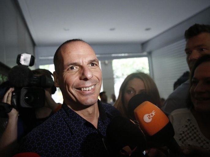 Yanis Varoufakis, Greece's finance minister, reacts whilst speaking to the media as he leaves the finance ministry in Athens, Greece, on Tuesday, June 30, 2015. Greece is staggering deeper into the economic unknown, saying it will miss a payment to the International Monetary Fund today and leaving the protection of Europe's bailout regime at midnight.