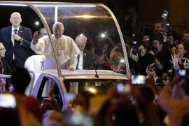 Pope Francis arrives to the Metropolitan Cathedral for evening prayers in Asuncion, Paraguay, Saturday, July 11, 2015. The pontiff is in Paraguay for three days, the last stop of his South American tour. (AP Photo/Cesar Olmedo)