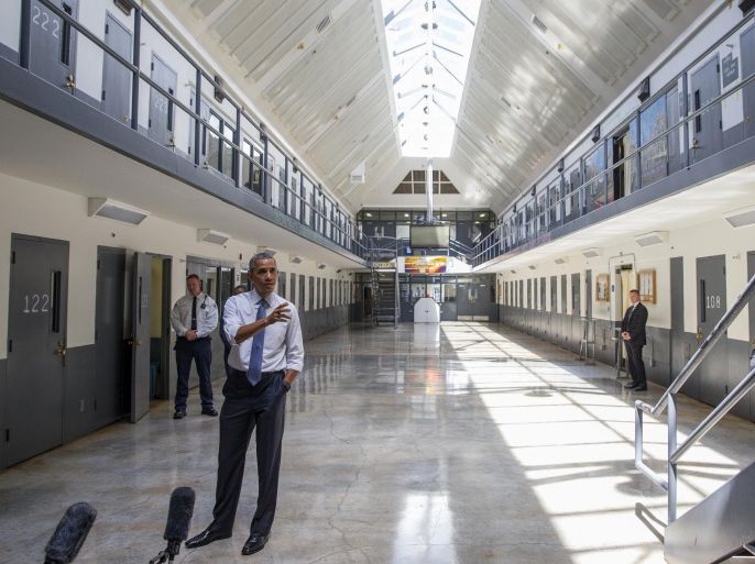 President Barack Obama speaks at the El Reno Federal Correctional Institution, in El Reno, Okla., Thursday, July 16, 2015. As part of a weeklong focus on inequities in the criminal justice system, the president will meet separately Thursday with law enforcement officials and nonviolent drug offenders who are paying their debt to society at the El Reno Federal Correctional Institution, a medium-security prison for male offenders near Oklahoma City. (AP Photo/Evan Vucci)