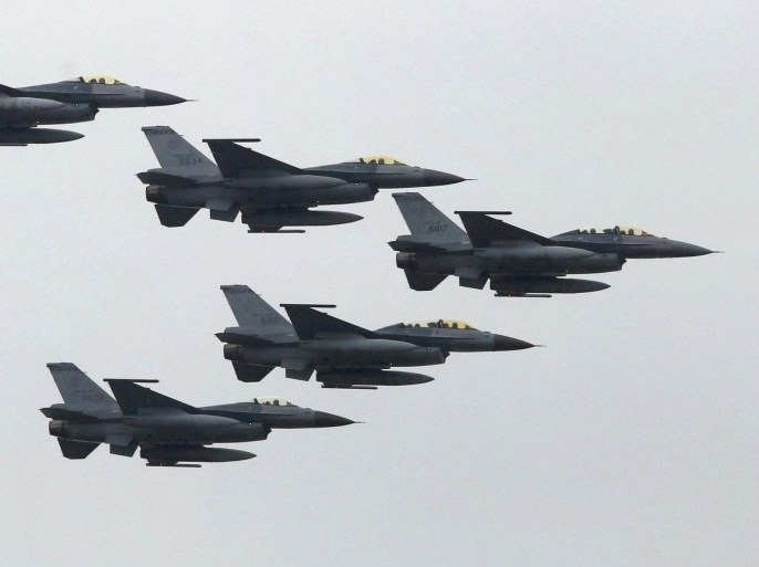 Taiwan Air Force's F-16 fighter jets fly during the annual Han Kuang military exercise at an army base in Hsinchu, northern Taiwan, July 4, 2015. REUTERS/Patrick Lin