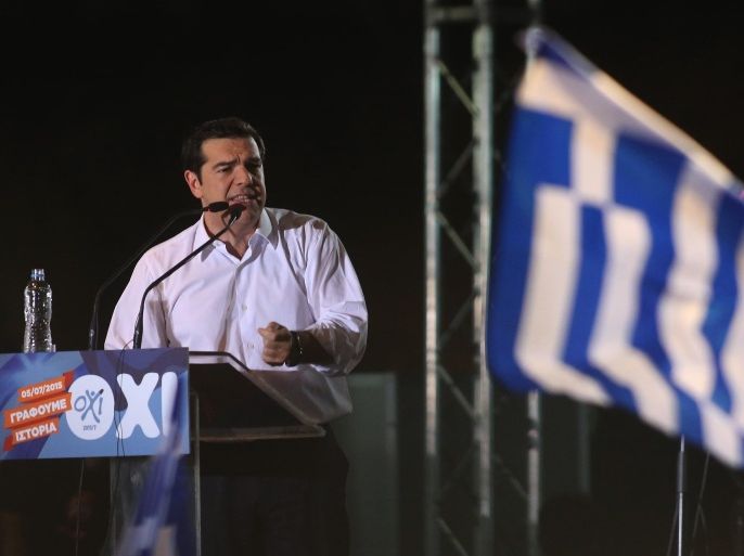 Alexis Tsipras, Greece's prime minister, speaks to supporters during a 'No' rally against accepting bailout conditions on Syntagma Square in Athens, Greece, on Friday, July 3, 2015. Greece and the euro region dug into their positions before the country's referendum on Sunday as polls show the outcome is impossible to predict and what happens next even more uncertain.