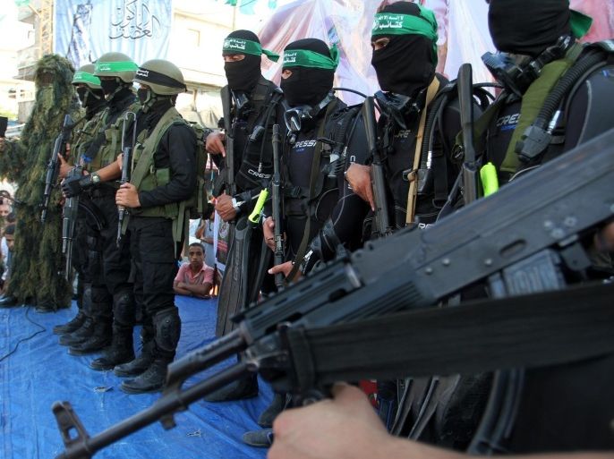 RAFAH, GAZA - JULY 13: Izz ad-Din al-Qassam Brigades, military wing of the Palestinian Hamas, attend a military parade in Rafah, Gaza on July 13, 2015, on the first anniversary of the 50-day war between Israel and Hamas' militants in the summer of 2014.
