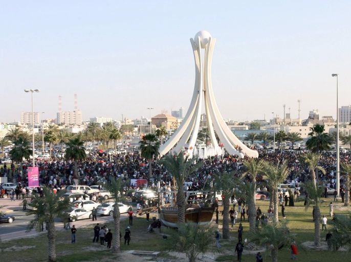 Thousands of anti-government protesters gather at Bahrain's Pearl roundabout in the capital Manama, on February 15, 2011, following the deaths of two protesters in clashes with Bahraini police and sparking angry calls from young cyber-activists for regime change and a walkout of parliament by Bahrain's main Shiite opposition bloc.