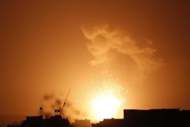 Explosion and smoke rises after a Saudi-led airstrike hit a site believed to be one of the largest weapons depot on the outskirts of Yemen's capital, Sanaa, on Saturday July 4, 2015. The Saudi-led coalition launched air raids in the capital, Sanaa, targeting the homes of Shiite rebels and their allies, as well as other sites across the country. (AP Photo/Hani Mohammed)