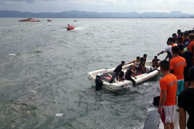 A handout photo provided by Philippine Coast Guard on 02 July 2015 shows the ongoing search and rescue operation next to a motorized boat that capsized off Ormoc City, Leyte province, Philippines, 02 July 2015. At least 36 people were killed when a passenger boat capsized off the central Philippines on 02 July 2015, with - according to latest counts - still 19 missing, a coast guard spokesman said. Emergency teams rescued 118 people from the seas off Ormoc City in Leyte province, 560 kilometres south-east of Manila, where the accident happened, said Commander Armand Balilo. The boat was carrying 173 passengers and 16 crew members, according to Balilo and the police. EPA/PHILIPPINE COAST GUARD/HANDPUT