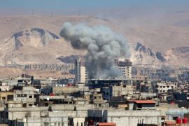 DAMASCUS, SYRIA - JULY 30: Smoke rises from Arbin district of Damascus after Assad forces attack to Damascus, on July 30, 2015.