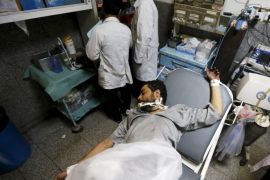 A patient lies on a bed at a government hospital in Sanaa, Yemen, June 24, 2015. A country that was already by far the poorest and most unstable on the Arabian Peninsula is now, after three months of conflict, in the grip of a humanitarian disaster. Cut off from the world, living under bombardment from a Saudi-led coalition and beset by fighting between multiple battalions and militias, Yemen's 25 million people are prey to hunger, disease and an ever-present fear of death. REUTERS/Khaled Abdullah