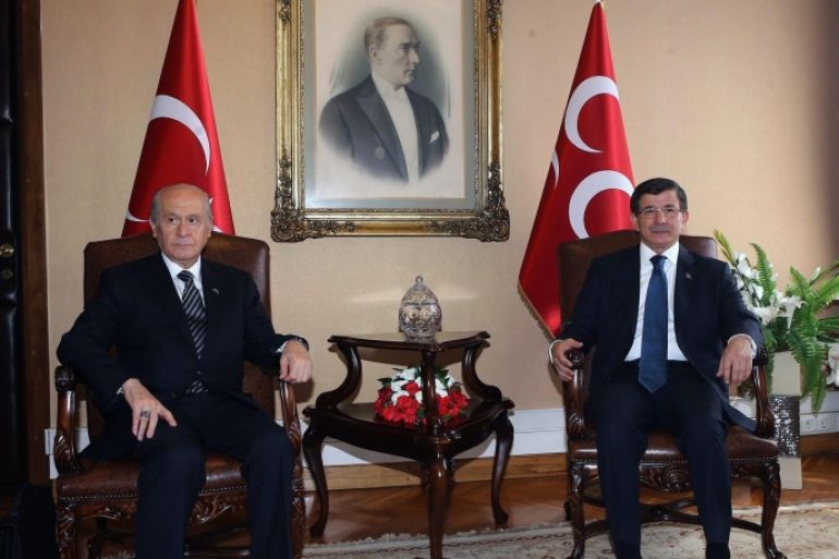 Turkish Prime Minister Ahmet Davutoglu (R) and Nationalist Movement Party (MHP) leader Devlet Bahceli (L) sit for a meeting on a coalition in Ankara, Turkey, 17 August 2015. Davotoglu and Bahceli met for a last effort to form a coaltion before deadlines. Another round of elections looked likely in Turkey after previous coalition talks between the country's ruling AKP party and the opposition CHP failed, more than two months after parliamentary elections.