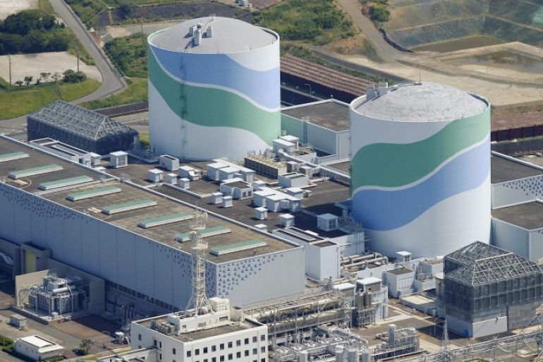 This aerial photo shows reactors of No. 1, right, and No. 2, left, at the Sendai Nuclear Power Station in Satsumasendai, Kagoshima prefecture, southern Japan, Tuesday, Aug. 11, 2015. Kyushu Electric Power Co. said Tuesday, Aug. 11, 2015, it had restarted the No. 1 reactor at its Sendai nuclear plant as planned. The restart marks Japan's return to nuclear energy four-and-half-years after the 2011 meltdowns at the Fukushima Dai-ichi nuclear power plant in northeastern Japan following an earthquake and tsunami.(Kyodo News via AP) JAPAN OUT, MANDATORY CREDIT