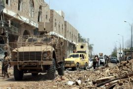 A photograph made available 05 August 2015 shows Yemeni forces backed by the Saudi-led coalition patrolling at a street after they controlled a strategic airbase in the southern province of Lahj, Yemen, 04 August 2015. Yemeni pro-government fighters have retaken full control of the strategic al-Anad airbase in the southern province of Lahj from Shiite Houthi rebels, the Defence Ministry said. Al-Anad is the country's largest base previously used by the US air forces as an intelligence-gathering hub and a platform for launching drone attacks on the Yemeni branch of al-Qaeda.