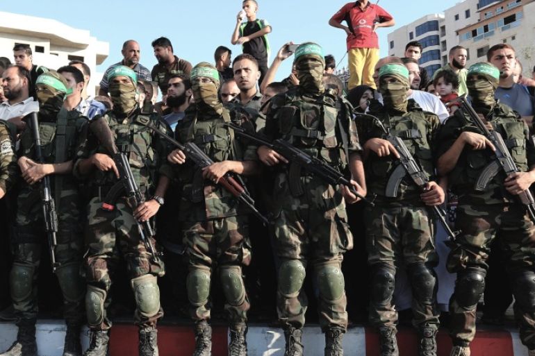 A picture made available on 27 August 2015 shows Palestinian fighters of the Izz ad-Din al-Qassam Brigades, the military wing of the Palestinian Hamas organization, taking part in a parade in Al Meena square in the west of Gaza City, Gaza Strip, 26 August 2015. The militants paraded demanding Israel to implement the cease-fire after the Israeli-Hamas conflict in the summer of 2014.