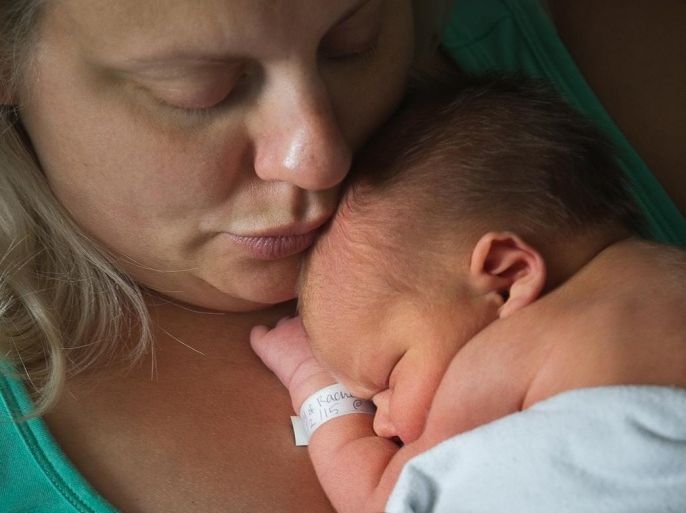 Rachel Montgomery, 36, of Media, Pa., is seen with her 2-day-old son Rowan on Thursday, June 4, 2015, at Pennsylvania Hospital in Philadelphia. (Alejandro A. Alvarez/Philadelphia Inquirer/TNS via Getty Images)