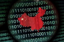 A map of China is seen through a magnifying glass on a computer screen showing binary digits in Singapore, in this January 2, 2014 file illustration photo. Security researchers have many names for the hacking group that is one of the suspects for the cyberattack on the U.S. government's Office of Personnel Management: PinkPanther, KungFu Kittens, Group 72 and, most famously, Deep Panda. But to Jared Myers and colleagues at cybersecurity company RSA, it is called Shell Crew, and Myers' team is one of the few who has watched it mid-assault — and eventually repulsed it. Myers' account of a months-long battle with the group illustrates the challenges governments and companies face in defending against hackers that researchers believe are linked to the Chinese government - a charge Beijing denies. To match story CYBERSECURITY-USA/DEEP-PANDA REUTERS/Edgar Su/Files