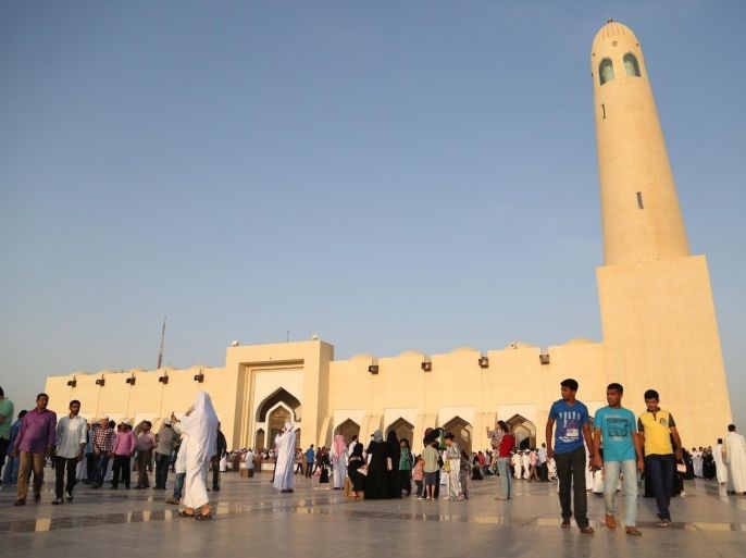 DOHA, QATAR - JULY 17: Muslims leave after they perform Eid el-Fitr prayer at Imam Muhammad ibn Abd al-Wahhab Mosque in Doha, Qatar, on July 17, 2015. Eid al-Fitr is a religious holiday celebrated by Muslims around the world that marks the end of Ramadan, Islamic holy month of fasting.