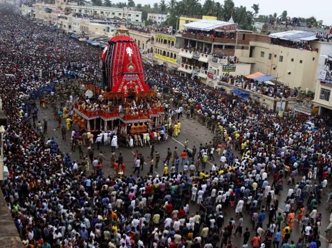 Indian devotees pull a chariot bearing an idol of Lord Jagannatha during the annual Rath Yatra or chariot journey festival in Puri, Orissa, India, 18 July 2015. Two people are reported killed and another 10 injured in a stampede during the Rath Yatra. The Rath Yatra of Hindu god Jagannath is one of the most important festivals in which devotees pull a chariot of lord Jagannath, his brother Balabhadra and sister Subhadra. The festival is mainly celebrated in Puri.