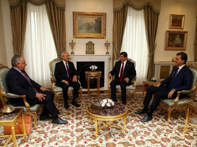 Turkey's Prime Minister Ahmet Davutoglu (2nd R) meets with main opposition Republican People's Party (CHP) leader Kemal Kilicdaroglu (2nd L) as part of their coalition talks in Ankara, Turkey, August 10, 2015. REUTERS/Hakan Goktepe/Prime Minister's Press Office/Handout via Reuters ATTENTION EDITORS - THIS PICTURE WAS PROVIDED BY A THIRD PARTY. REUTERS IS UNABLE TO INDEPENDENTLY VERIFY THE AUTHENTICITY, CONTENT, LOCATION OR DATE OF THIS IMAGE. THIS PICTURE IS DISTRIBUTED EXACTLY AS RECEIVED BY REUTERS, AS A SERVICE TO CLIENTS. FOR EDITORIAL USE ONLY. NOT FOR SALE FOR MARKETING OR ADVERTISING CAMPAIGNS. NO SALES. NO ARCHIVES. THIS IMAGE HAS BEEN SUPPLIED BY A THIRD PARTY. IT IS DISTRIBUTED, EXACTLY AS RECEIVED BY REUTERS, AS A SERVICE TO CLIENTS.