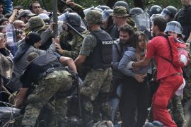 Migrants who waited more then 48 hours on the Greek side of the border line, breaking through cordon of Macedonian special police forces to cross in Macedonia near southern city of Gevgelija, The Former Yugoslav Republic of Macedonia, 22 August 2015.Macedonian special police forces arrived yesterday morning and blocked the illegal border crossing between Macedonia and Greece. They don't give permission to the migrants to pass in Macedonia. Macedonian government has declared emergency situation in the south and north border with Greece and Serbia due to rising number of migrants and fugitives from Syria, Afganistan, Iraq, Pakistan and Somalia. From the beginning of the year to mid-June 2015, nearly 160,000 migrants landed in the southern European countries, mainly Greece and Italy, on their way to wealthier countries in Western and Northern Europe, according to estimates by the International Organization for Migration (IOM).