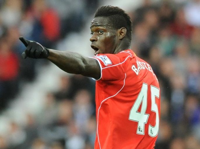 Liverpool's Mario Balotelli points during the English Premier League soccer match between West Bromwich Albion and Liverpool at the Hawthorns, West Bromwich, England, Saturday, April 25, 2015. (AP Photo/Rui Vieira)