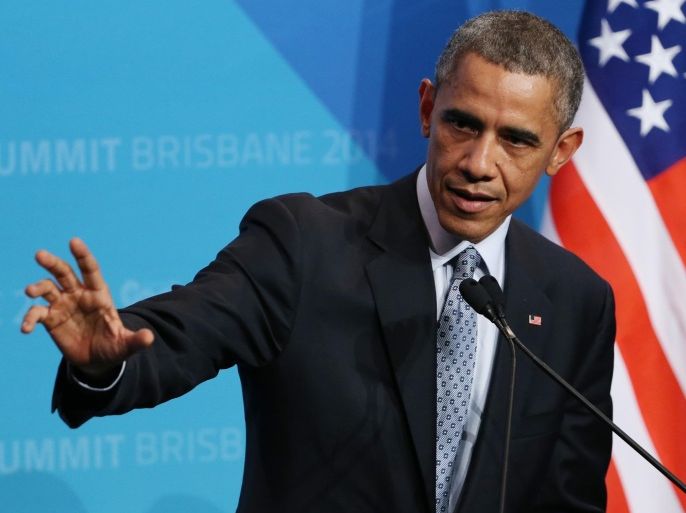 U.S. President Barak Obama gestures as he answers a question from the media during a press conference at the conclusion of the G-20 summit in Brisbane, Australia, Sunday, Nov. 16, 2014.(AP Photo/Rob Griffith)