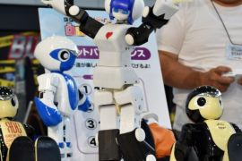 Robot 'Premaid AI' (C) created by Japanese company DMM.make ROBOTS is displayed at a robot event for children in Tokyo on August 9, 2015. The robot event 'Wakudoki (Exciting) Robot Park' runs to August 14 at Toyota Motor exhibition showroom Mega Web. AFP PHOTO / KAZUHIRO NOGI