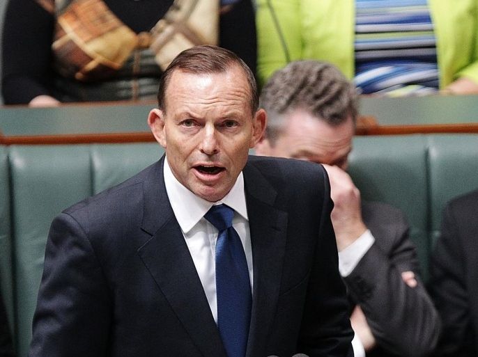 CANBERRA, AUSTRALIA - AUGUST 10: Prime Minister Tony Abbott speaks to Tony Smith in his new roll as Speaker of the House of Represenatives at Parliament House on August 10, 2015 in Canberra, Australia. Bronwyn Bishop resigned as speaker on 3, August following public outcry over travel expenses.