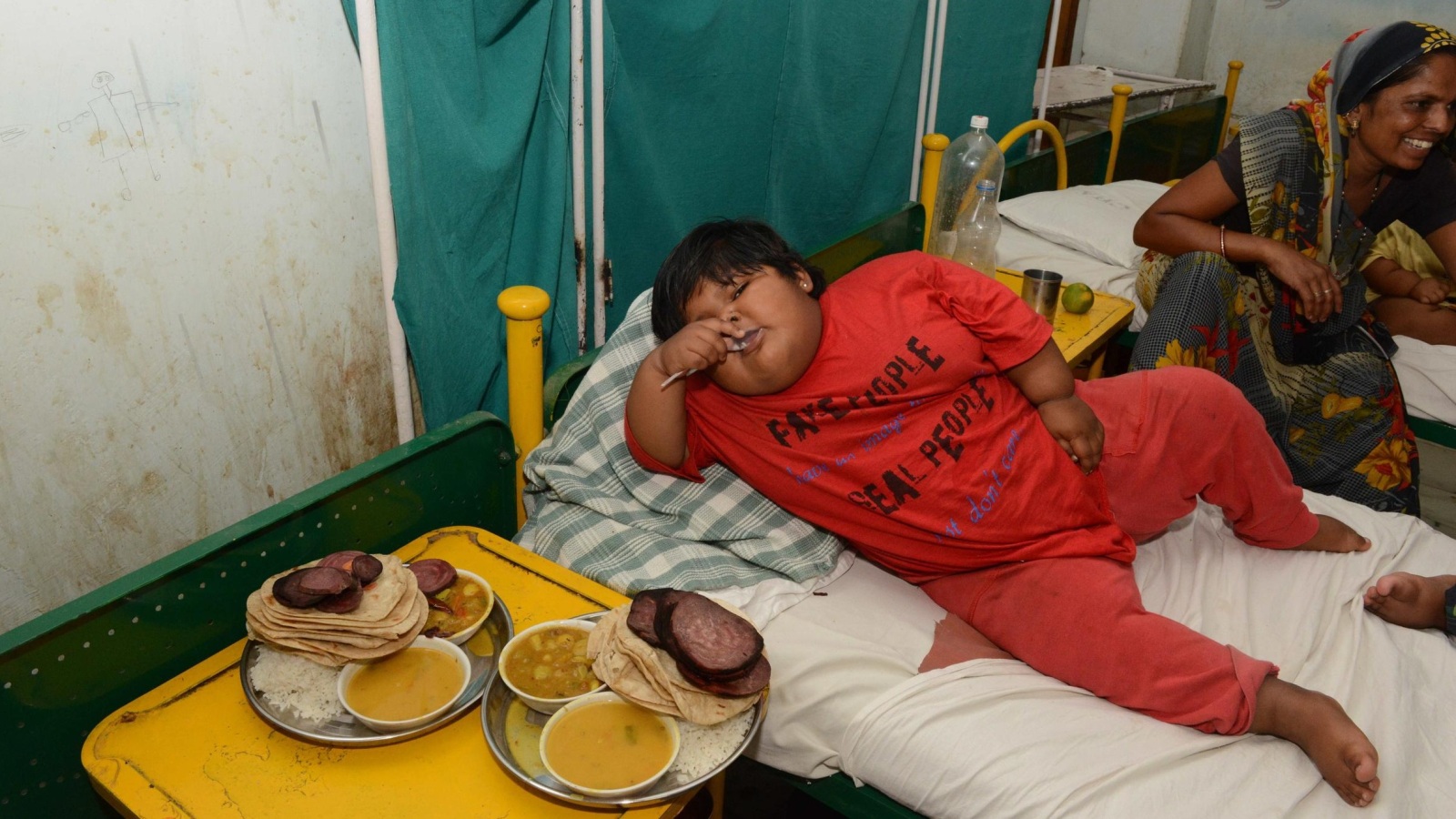 ‪طفل هندي يعاني من بدانة مفرطة‬  (غيتي/ الفرنسية)