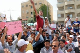 Palestinian refugees shout slogans against the UNRWA Commissioner in front of the United Nations Relief and Works Agency (UNRWA) headquarters in Amman, Jordan, 05 August 2015. Thousands of Palestinian students, teachers and workers gathered to protest against the reduction of services to Palestinian refugees in Jordan. Some 200,000 Palestinian refugee students from 14 refugee camps in Jordan are enrolled in schools.