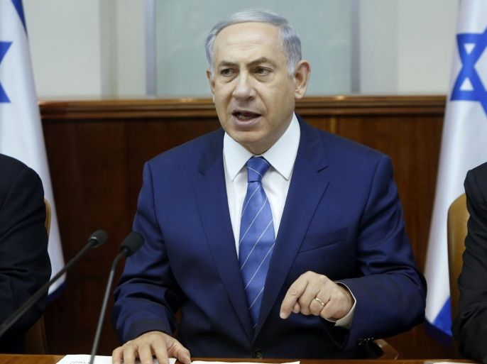 Israeli Prime Minister Benjamin Netanyahu chairs the weekly cabinet meeting at his Jerusalem office on August 2, 2015. Over the weekend Netanyahu appealed to Palestinian Authority President Mahmoud Abbas to fight terrorism together with Israel. His appeal follows the arson attack allegedly by Jewish extremists in which eighteen month old Palestinian Ali Dawabsha died.