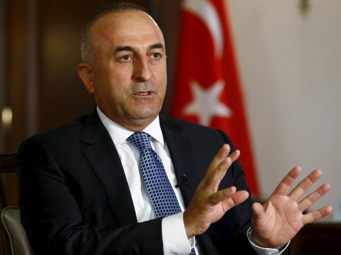 Turkey's Foreign Minister Mevlut Cavusoglu answers a question during an interview with Reuters in Ankara, Turkey, August 24, 2015. Turkey and the United States will soon launch "comprehensive" air operations to flush Islamic State fighters from a zone in northern Syria bordering Turkey, Cavusoglu told Reuters on Monday. To match Interview MIDEAST-CRISIS/TURKEY REUTERS/Umit Bektas