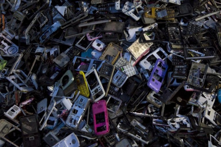 Old cellular phone components are discarded inside a workshop in the township of Guiyu in China's southern Guangdong province June 10, 2015. The town of Guiyu in the economic powerhouse of Guangdong province in China has long been known as one of the world’s largest electronic waste dump sites. At its peak, some 5,000 workshops in the village recycle 15,000 tonnes of waste daily including hard drives, mobile phones, computer screens and computers shipped in from across the world. Many of the workers, however, work in poorly ventilated workshops with little protective gear, prying open discarded electronics with their bare hands. Plastic circuit boards are also melted down to salvage bits of valuable metals such as gold, copper and aluminum. As a result, large amounts of pollutants, heavy metals and chemicals are released into the rivers nearby, severely contaminating local water supplies, devastating farm harvests and damaging the health of residents. The stench of burnt plastic envelops the small town of Guiyu, while some rivers are black with industrial effluent. According to research conducted by Southern China’s Shantou University, Guiyu’s air and water is heavily contaminated by toxic metal particles. As a result, children living there have abnormally high levels of lead in their blood, the study found. While most of the e-waste was once imported into China and processed in Guiyu, much more of the discarded e-waste now comes from within China as the country grows in affluence. China now produces 6.1 million metric tonnes of e-waste a year, according to the Ministry of Industry and Information Technology, second only to the U.S with 7.2 million tonnes. REUTERS/Tyrone Siu PICTURE 12 OF 18 FOR WIDER IMAGE STORY "WORLD'S LARGEST ELECTRONIC WASTE DUMP"SEARCH "GUIYU SIU" FOR ALL IMAGES